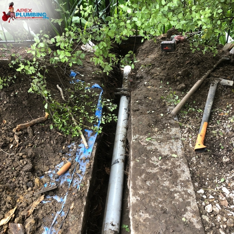 Exposed and damaged underground pipes in need of Apex Plumbing Services' pipe relining Sydney Wide services.