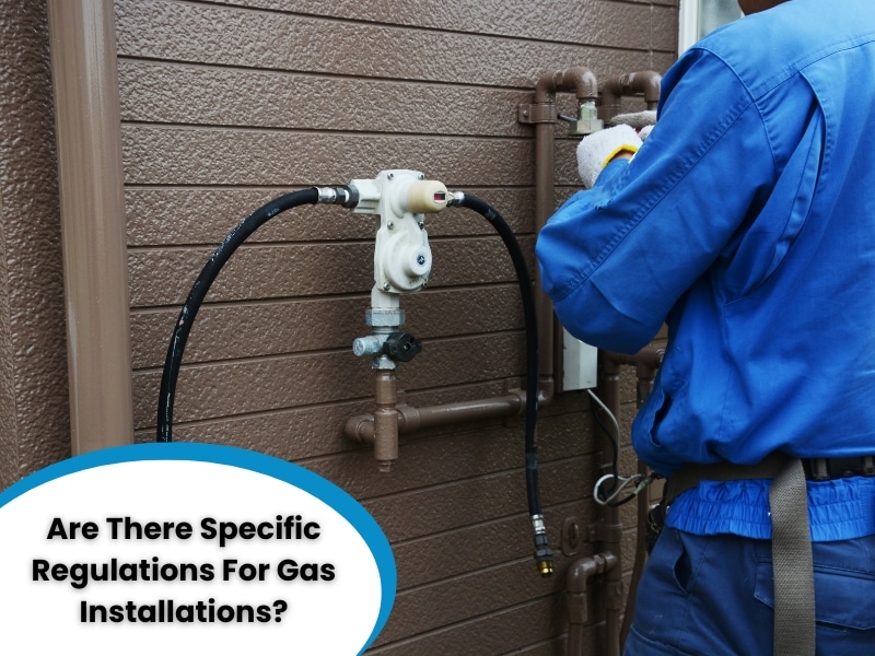 Technician working on a gas meter setup, adhering to gas installation regulations and safety standards.