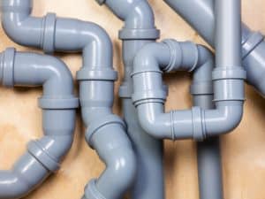 a visual representation of a PVC pipe as one of the types of pipes