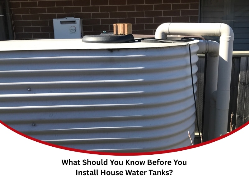 house water tanks installation grey corrugated tank beside brick house