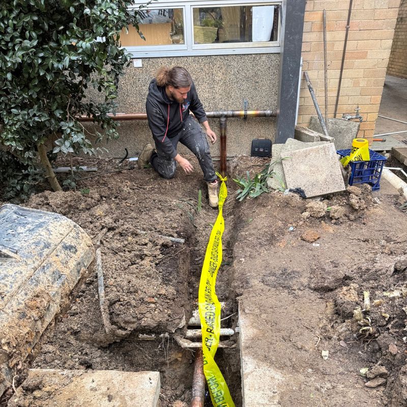 Gas fitting installation process showing secure pipe connections