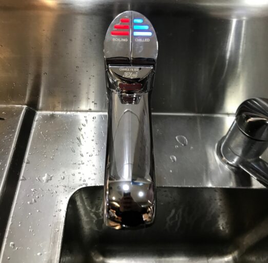 Plumber installing a home water filtration system in Sydney